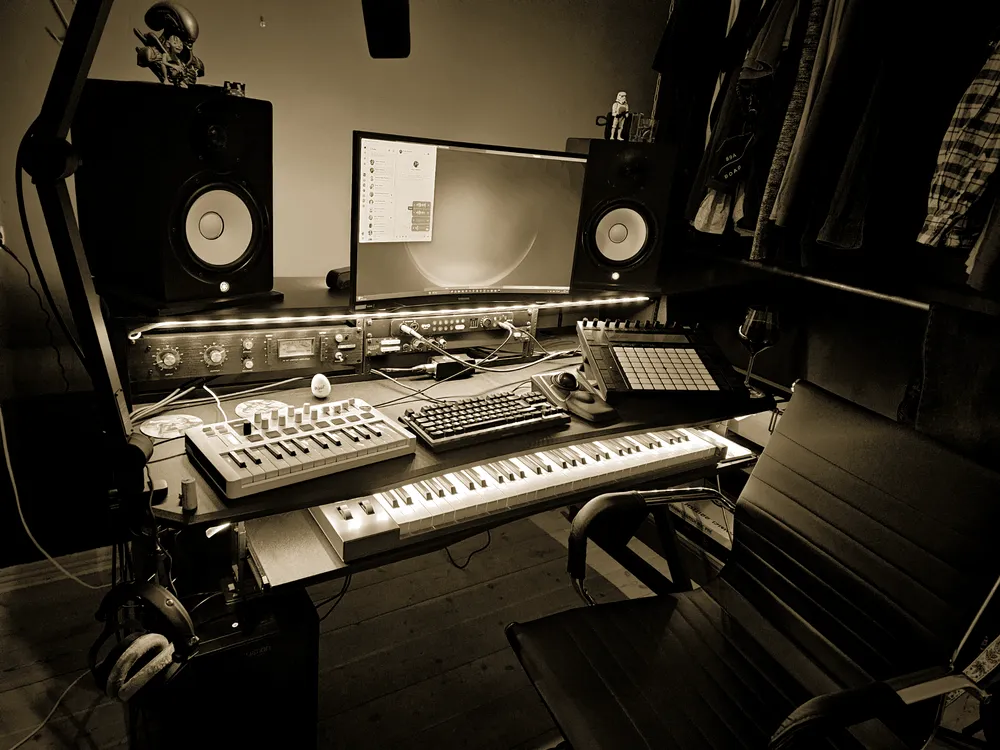 The control desk from the side, with outboard, controllers and keyboard